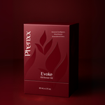 Red box of Phenxx Evoke Alchemé Oil with biogeometry design on a red background