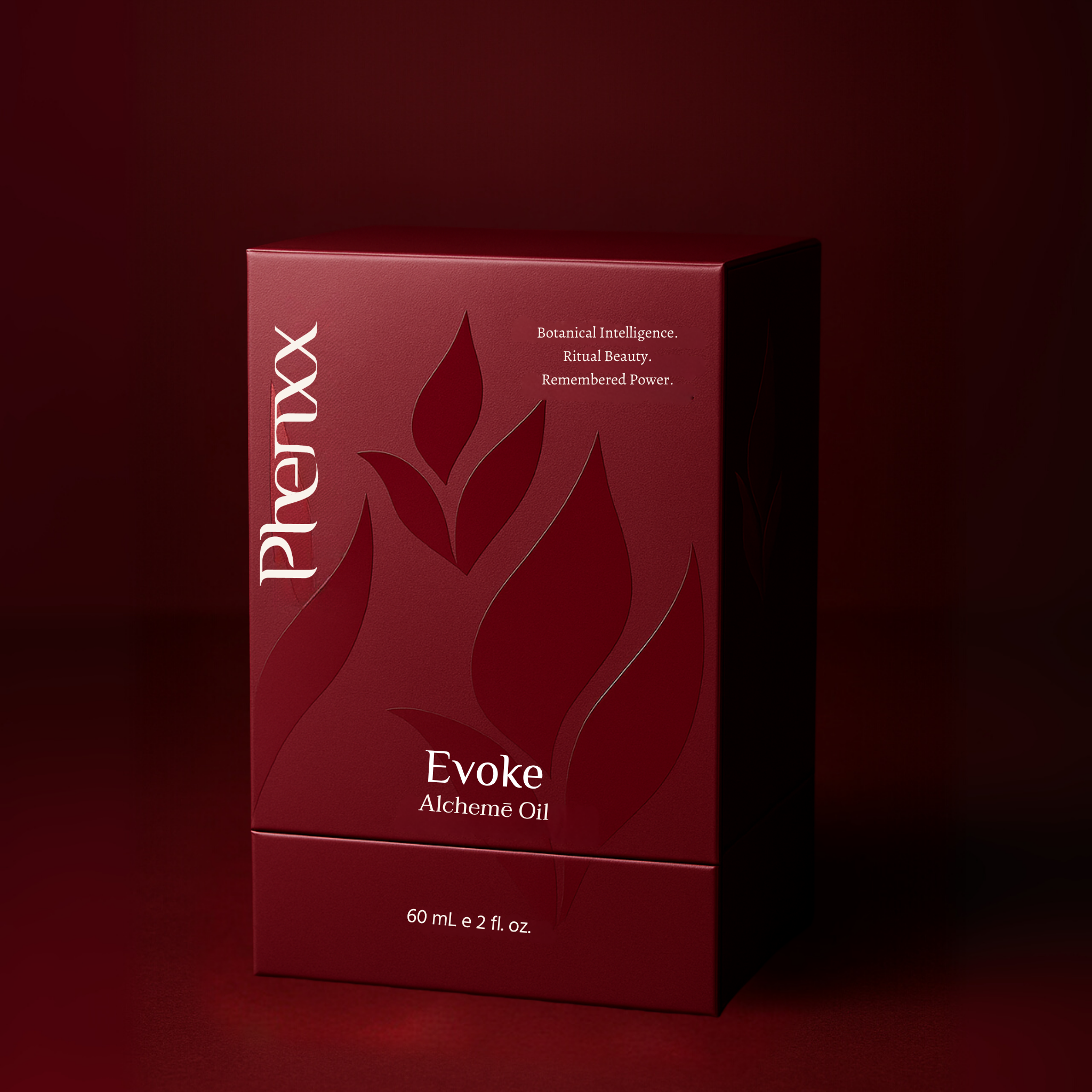 Red box of Phenxx Evoke Alchemé Oil with biogeometry design on a red background